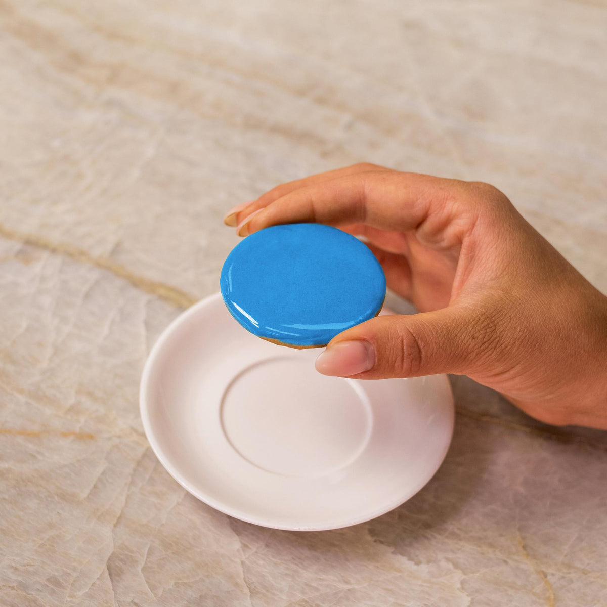 Blue icing on cookie made with natural food coloring powder.
